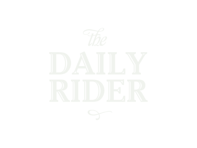 The Daily Rider bike shop logo on forest green background