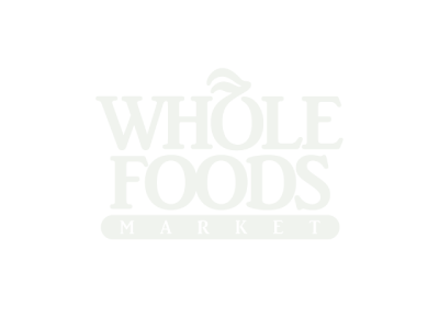 Whole Foods Market logo on forest green background